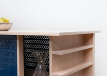 Load image into Gallery viewer, Mid-Century Modern Kitchen Island Work Station, Minimalist Prep or Utility Table with Storage Peg Boards, Shelves and Spice Rack. Handmade of Solid Wood and Powder Coated Metal. Available in Walnut, Oak or Ash with Oval or Rectangular Top. Custom Paint Colors Available.